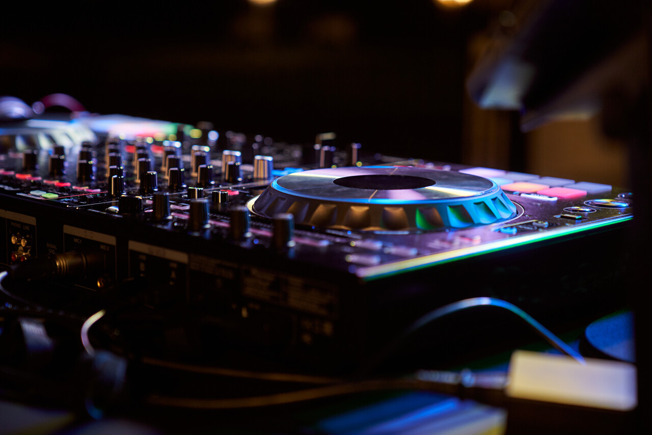 Close up of a dj mixer under blue light 2026 03 15 23 28 25 utc