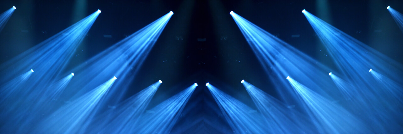 Illuminating blue light beams shining in the dark 2026 03 20 04 24 49 utc