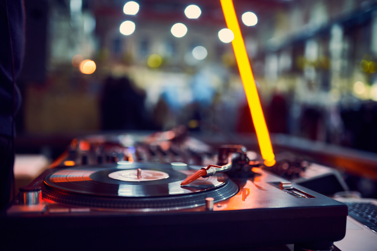 Turntable vinyl record at night club blured back 2026 01 08 23 02 00 utc